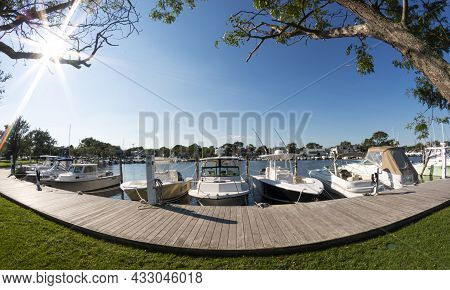 Babylon, New York, Usa - 7 September 2021: Fisheye View Of Boats Docked In A Marina On A Sunny Morni