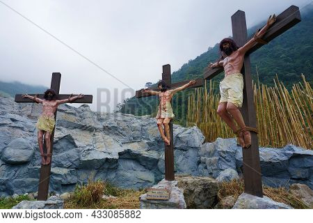 Replica Of Jesus Christ On The Cross Between Two Thieves. Photo Taken In Benguet, Philippines, South
