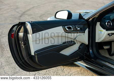 Dnepropetrovsk, Ukraine - 08.24.2021: Photos Of Mercedes Benz Sl550 Convertible. Type Of Doors. Deta