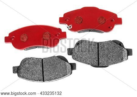 Brake Pads. Car Brake Pads On A White Background. Red Brake Pad Set. Spare Parts For The Car. Textur