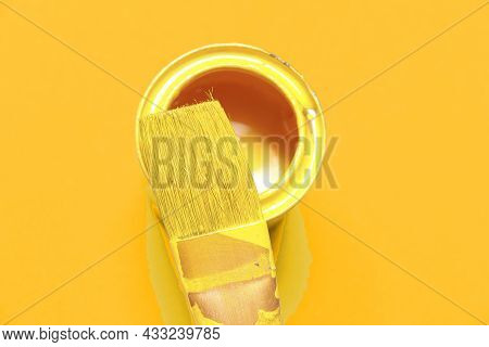 Yellow Paint And Yellow Paint Brush With Yellow Backround Color