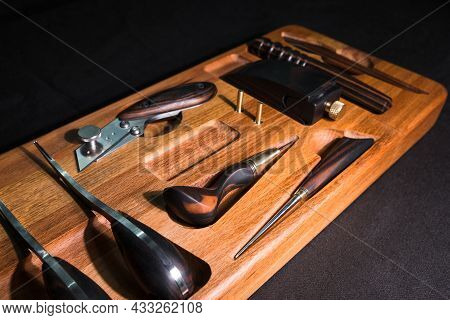 Exclusive Handmade Leather Craft Tools. Close Up Of Different Tanner Tools On Wooden Box. Set Of Dif