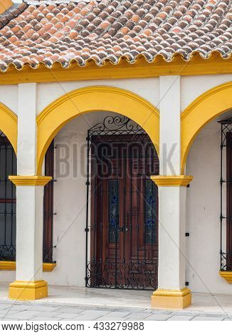 Facade Of A White And Yellow Traditional House In Tlacotalpan, Veracruz, Mexico