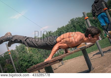 14Th July Of 2020, Russia, Tomsk: Man Do Sport Exercise At The Sport Court