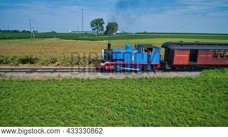 Ronks, Pennsylvania, June 2019 - Aerial View Of Thomas The Tank Engine Approaching Pulling Passenger