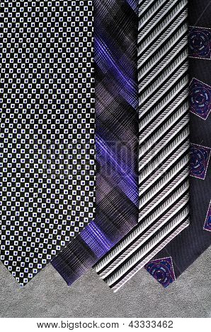 Ties in tones of black and silver