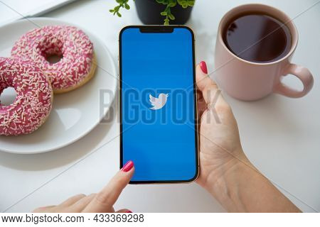 Alanya, Turkey - August 6 2021: Woman Hand Holding Iphone 12 Pro Max Gold With Social Networking Ser