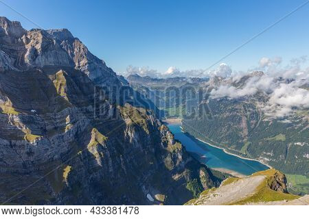 Swiss Glaernisch Mountain And Lake Kloental With Blue Sky