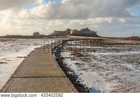 Elizabeth Castle In A Low Tide With Road On The Sea Bottom, Saint Helier, Bailiwick Of Jersey, Chann