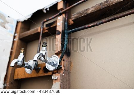 Laundry Room Renovation With Plaser Walls Interior Exposed With Taps And Copper Pipes, Home Renovati