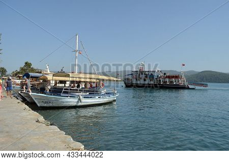 Boats and yachts at the in the marina of village Akyaka - slow city in Turkey.August 1,2021. Mugla,Turkey