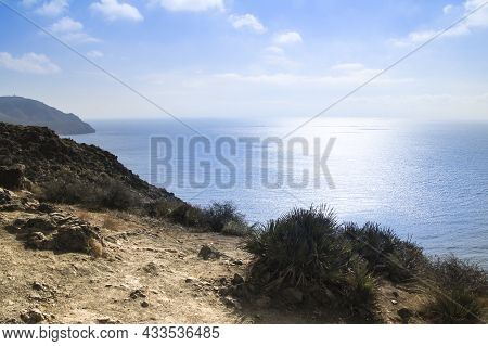 Beautiful Seascape In Isleta Del Moro Village. Volcanous In The Background.