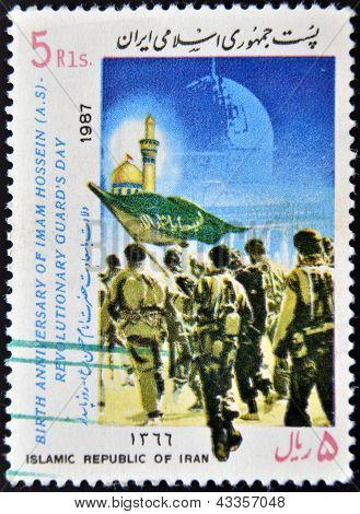 A stamp printed in Iran dedicated to birth anniversary of Imam Hossein - revolutionary guardï¿½s day