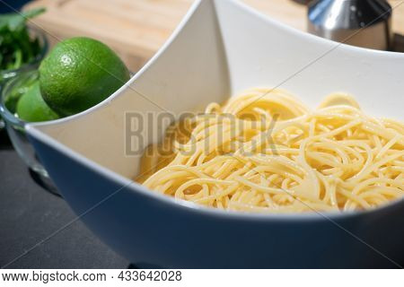Cooked Spaghetti Pasta In Square White Bowl On Kitchen Counter And Ready To Cook In Next Process