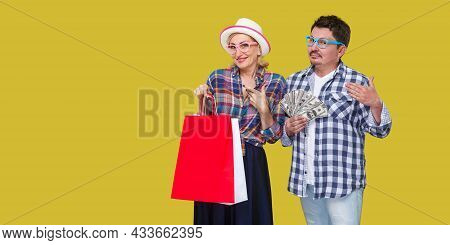 Happy Family After Shopping, Adult Man And Woman In Casual Checkered Shirt Standing Together, Wife H
