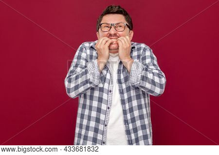 Portrait Of Worried Nervous Or Stressed Middle Aged Business Man In Casual Checkered Shirt And Eyegl