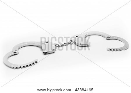 Metal håndjern isoleret