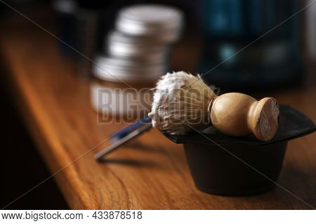 Set Of Shaving Equipment And Men's Cosmetic Products On Wooden Table, Barbershop. Shave Concept With