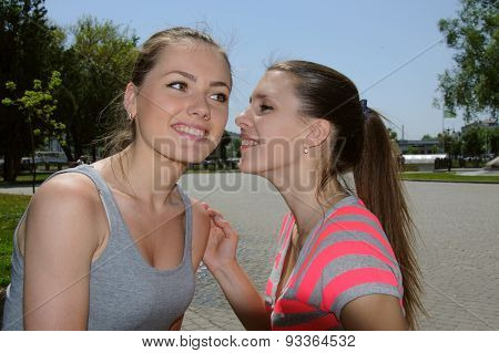 One Girl Tells Another Secret Whisper