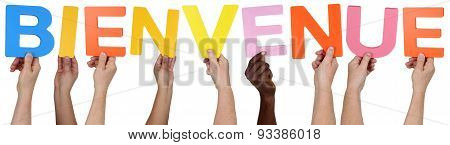 Multi Ethnic Group Of People Holding The French Word Bienvenue Welcome
