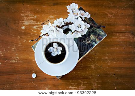 Cup Of Coffee, A Book And Blossoming Branch