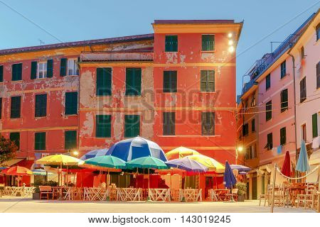 The old main square on the waterfront in the Italian village of Vernazza at night. Parco Nazionale delle Cinque Terre, Liguria, Italy.