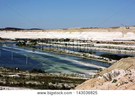 The development of the chalk pit. Maintenance  work  quarry.
