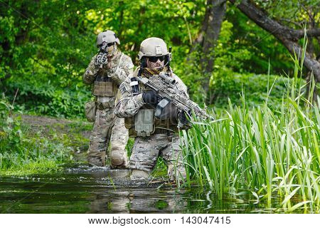 Green Berets US Army Special Forces Group soldiers in action