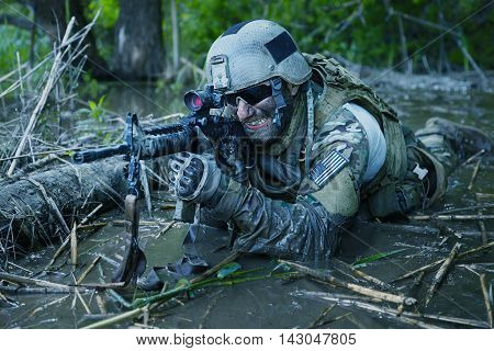 Green Berets US Army Special Forces Group soldier in action