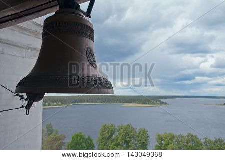 Church bell in the Nilov monastery. View of Lake Seliger. Russia
