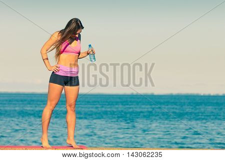 Woman Drinking Water After Sport Gym Outdoor