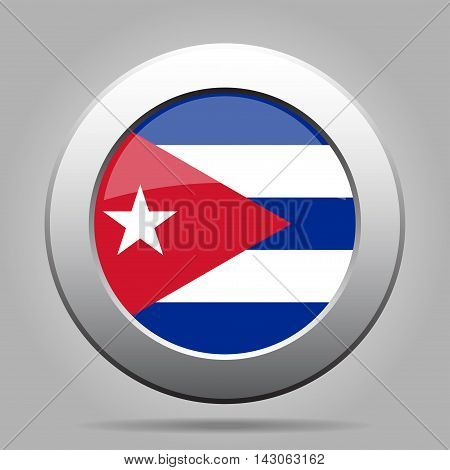 metal button with the national flag of Cuba on a gray background