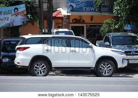 CHIANGMAI THAILAND -JULY 27 2016: Private car Toyota Fortuner. Suv for Urban User. On road no.1001 8 km from Chiangmai Business Area.