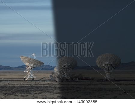 Very Large Array Radio Telescopes dish alignment in New Mexico USA twilight to night transition concept