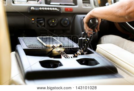 adapter converter charger plug phone with charging cable on a car