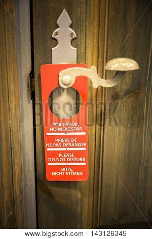 Door sign hanger on a handle - Do Not Disturb