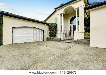 Luxury House Exterior With Concrete Floor Porch With Columns