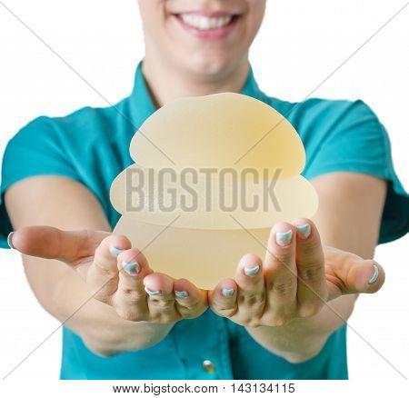 Silicone breast implant.Doctor hold silicone breast implants