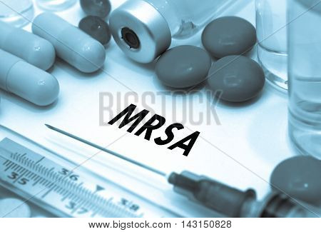 MRSA (methicillin-resistant Staphylococcus aureus). Treatment and prevention of disease. Syringe and vaccine. Medical concept. Selective focus