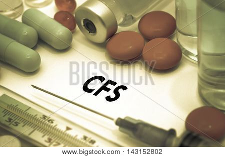 CFS (chronic fatigue syndrome). Treatment and prevention of disease. Syringe and vaccine. Medical concept. Selective focus