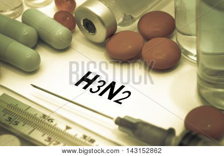 h3n2 (influenza grippe). Treatment and prevention of disease. Syringe and vaccine. Medical concept. Selective focus