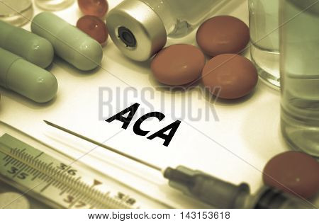 ACA (affordable care act). Treatment and prevention of disease. Syringe and vaccine. Medical concept. Selective focus