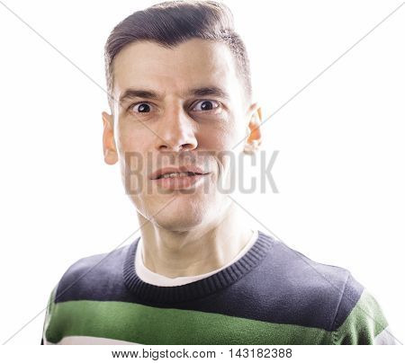 Portrait of a smart serious young man standing against white background. Emotional concept for gesture close up