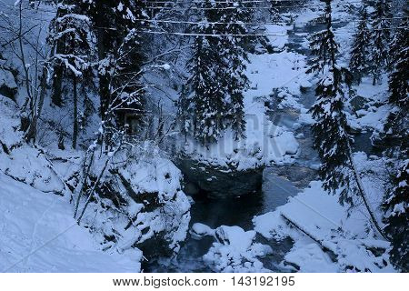 Winter mountains snow river stones forest pine V
