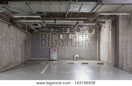 Parking garage underground interior neon lights in dark