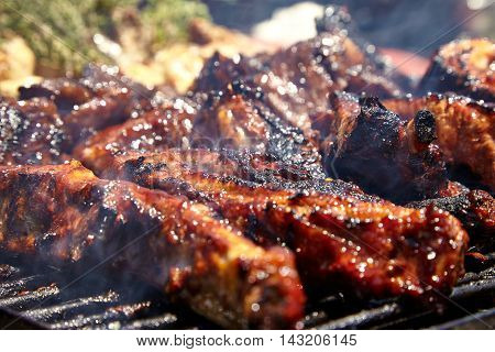 BBQ Grilled pork ribs on the grill.