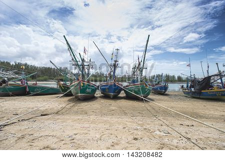 Three fishing boat on the beach, Paknam Pran, Thailand