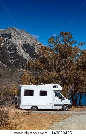 Motorhome Camper At Lake Pearson / Moana Rua Wildlife Refuge Located In Craigieburn Forest Park In C