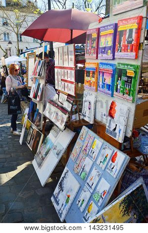Paris, France - April 20, 2015: Tourists In Place Du Tertre In Montmartre, The Square Is Full Of Res