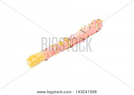 Pink frosting covered stick isolated on white background.